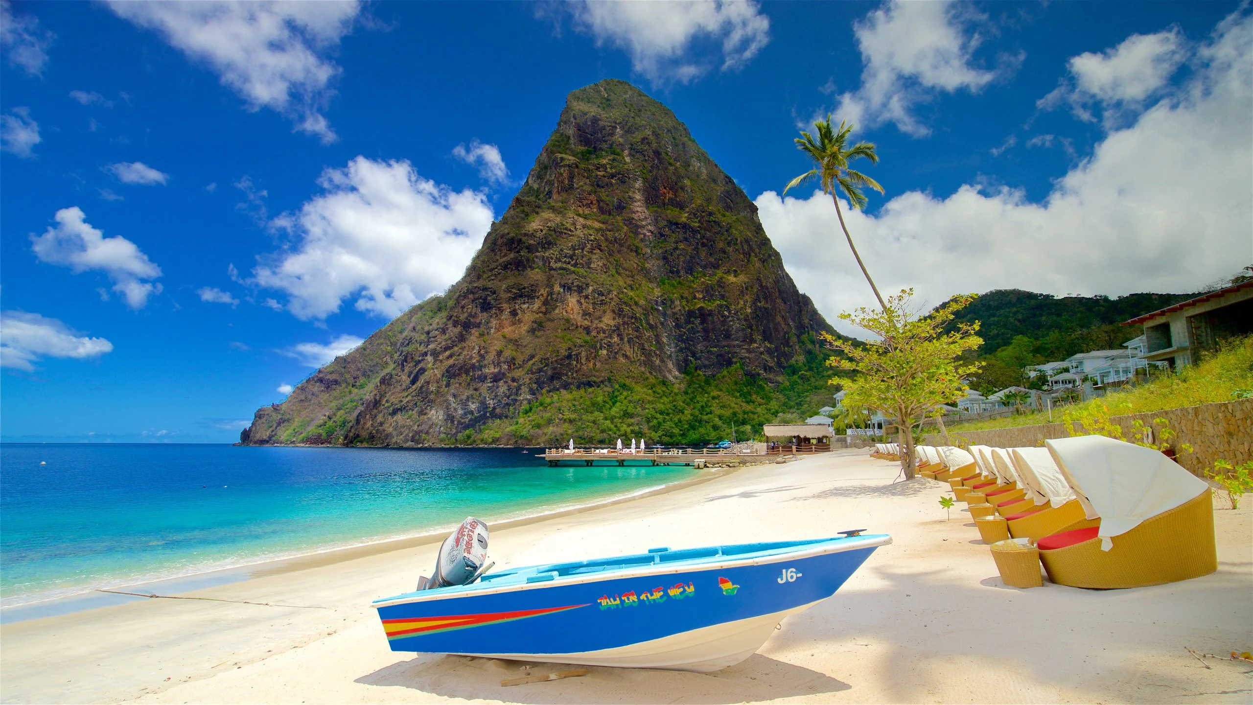 Saint Lucia citizenship by investment passport stamp and luxury scenery