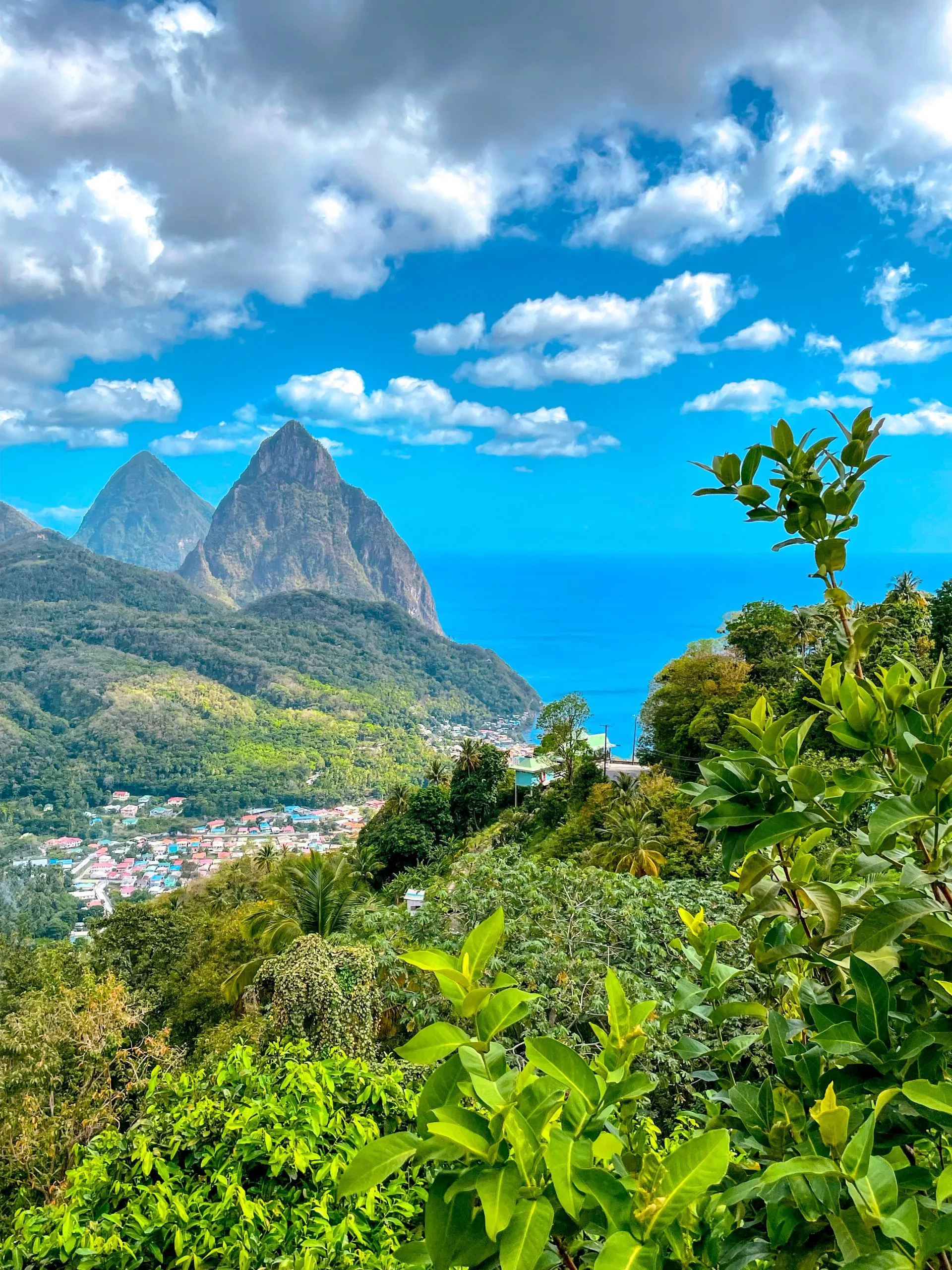 Saint Lucia citizenship by investment passport stamp and luxury scenery