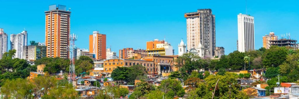 Business owner reviewing Paraguay investor visa documents in office